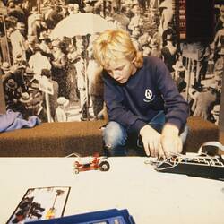 Digital Photograph - Virgil Bulow programming LEGO vehicle using Logo, Sunrise Classroom, Melbourne Museum, Russell Street, 1989