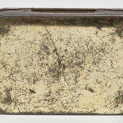 Base of rectangular metal tobacco tin. Scuffed.