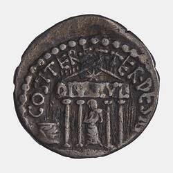 Rough round coin. Temple with standing veiled figure.  Text and star above. Beaded arc above.