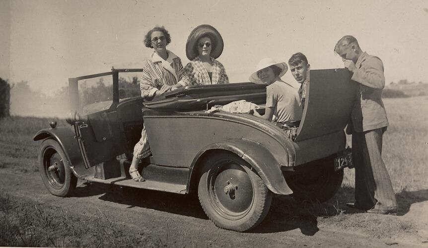 Digital Photograph - Young Couple Sitting in 'Dickie Seat' of Car on Family Drive, 1930s