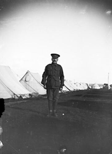Digital Photograph - Soldier outside Tents at Royal Park Army Camp, Parkville, circa 1915