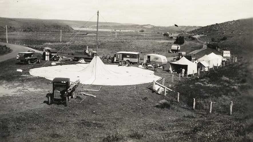 Digital Photograph - Holden Brothers Circus, 'Big Top ' Circular Tent being Raised up Central Pole surrounded by Caravans & Tents, early 1930s