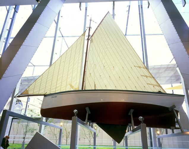 Wooden sailboat on display