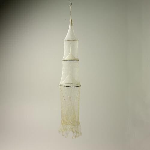 Long tubular fishing net.