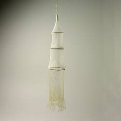 Long tubular fishing net.