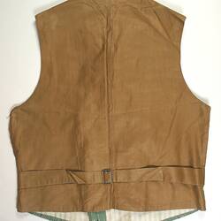 Back of waistcoat, mustard yellow colouring with strap.