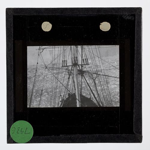 Lantern Slide - 'A Berg With Much Brash Ice' is Ahead of the Discovery, BANZARE Voyage 1, Antarctica, 1929-1930