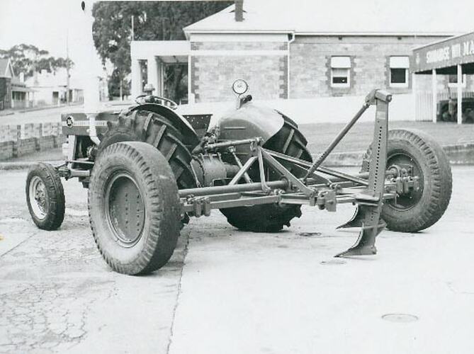 Rear view of a tractor showing a subsoil ripper.