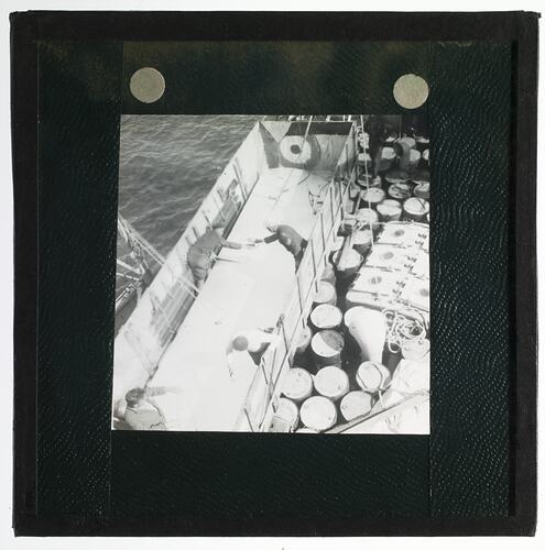 Lantern Slide - The Loading of Aeroplane Spares onto the Discovery II, Ellsworth Relief Expedition, Antarctica, 1936-1936