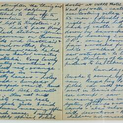 Open book, 2 cream pages with faint grid pattern. Cursive handwritten text in blue ink. Page 34 and 35.