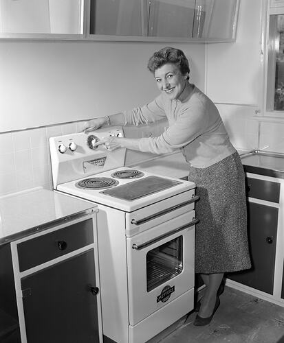 Phelan Ready Built Home, Woman & Kitchen Stove, Mount Martha, Victoria, 13 May 1959