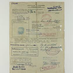Certificate on off-white paper with printed and written text, eleven stamp marks and thumbprint.