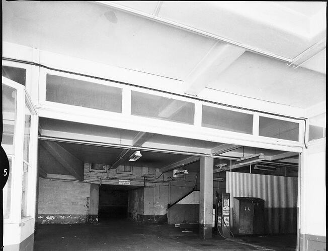 Monochrome photograph of a building interior.
