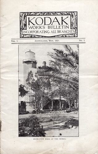 Paper cover with photograph of factory garden.