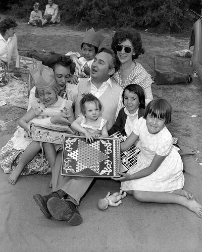 Family Group with Gifts, Cheltenham Park, Victoria, 06 Dec 1959