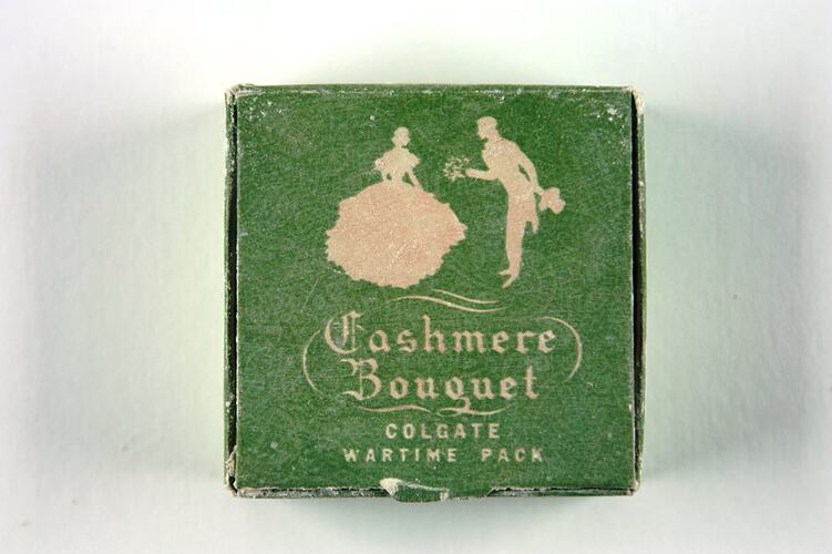 Green box with silhouette of man and woman.
