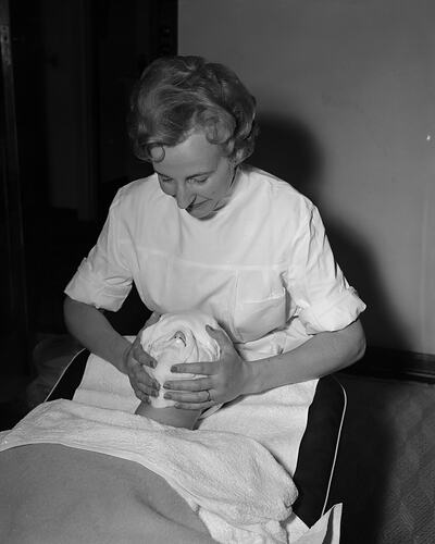 Beautician Giving a Treatment, South Yarra, Victoria, 15 Feb 1960