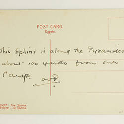 Back of postcard with printing and brief handwriting.