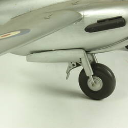 Silver model aeroplane.